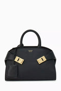 Mini Hug Top Handle Bag in leather